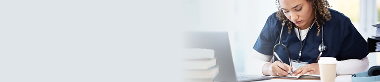 A provider writing on a paper
