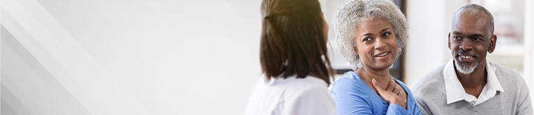 A provider talking to patients