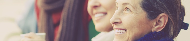 A few women smiling close up