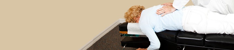 A woman at the chiropractor