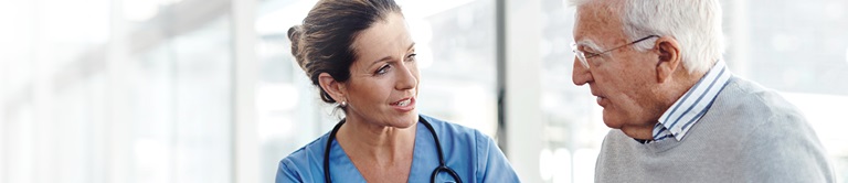 A doctor speaking with patient