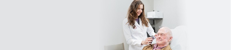 A provider helping a patient