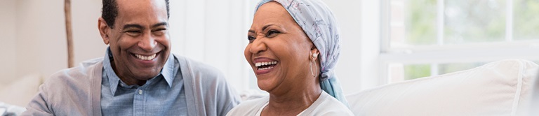 Head and Neck Cancer patient smiling with doctor