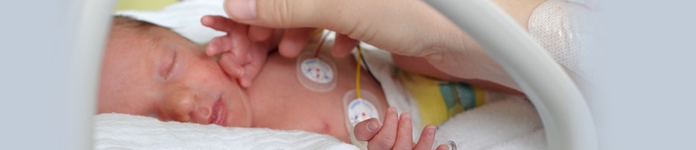 NICU baby hooked up to monitors