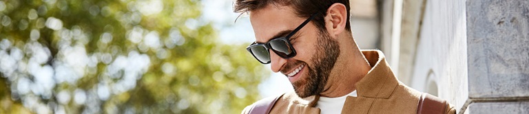 A man outside with sunglasses