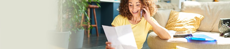 A woman looking at paper
