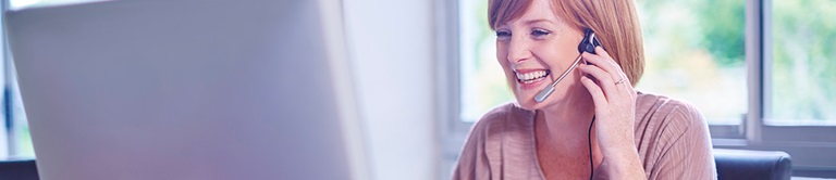 woman talking on the phone using a headset