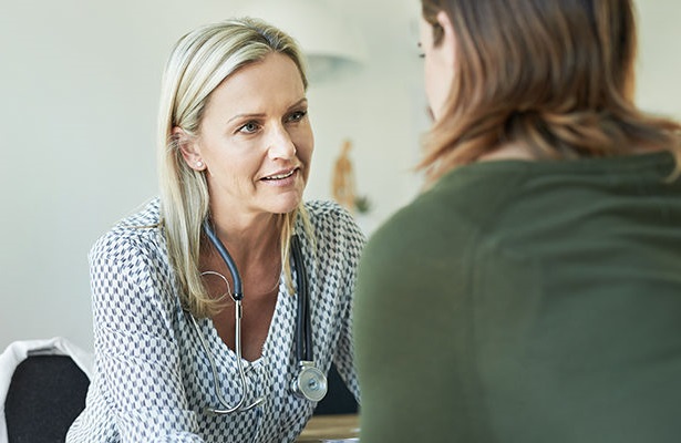 Image of provider talking to patient