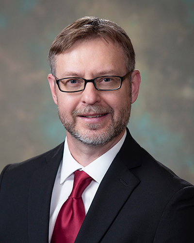 Andrew M Guminski MD