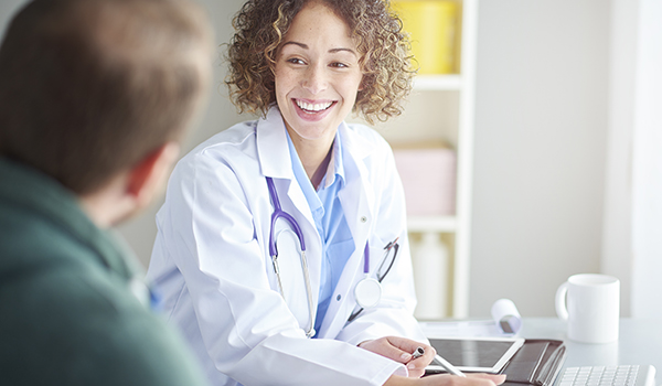 doctor talking to patient