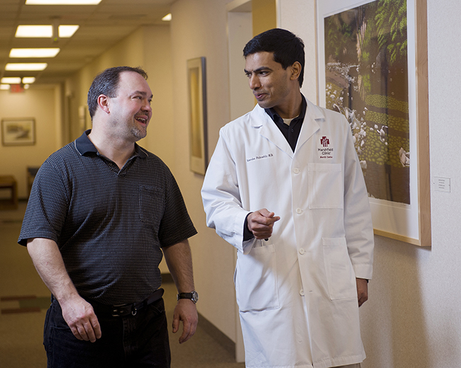 A patient talks with his Marshfield Clinic physician