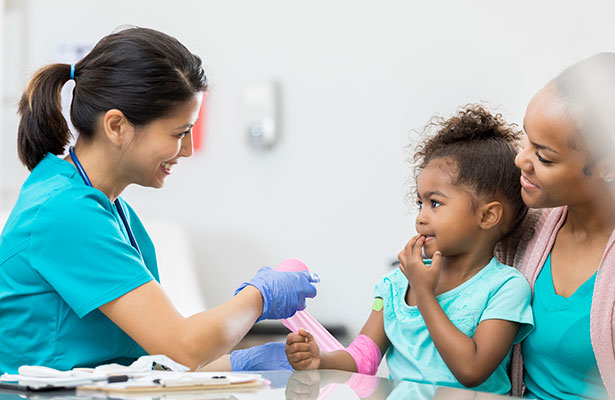 Doctor taking care of a young patient