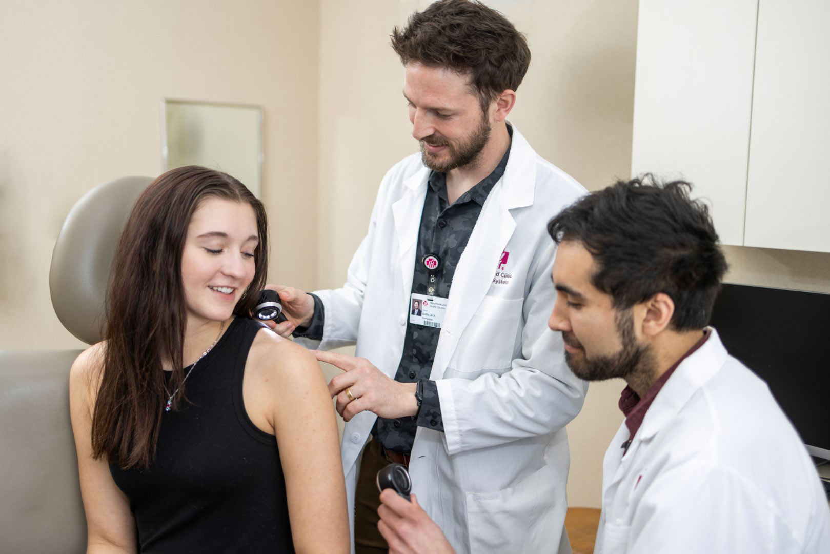 doctors examining patient