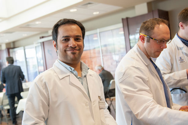 smiling doctor in lobby