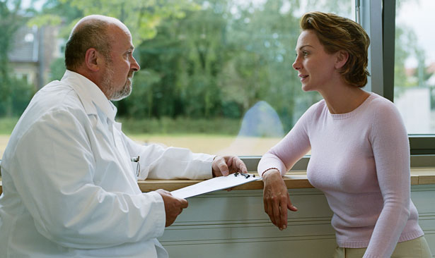 doctor talking to patient