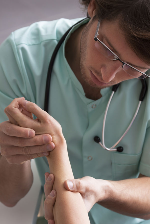 Dermatologist looking at skin