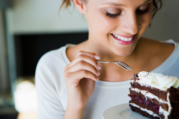 woman eating cake