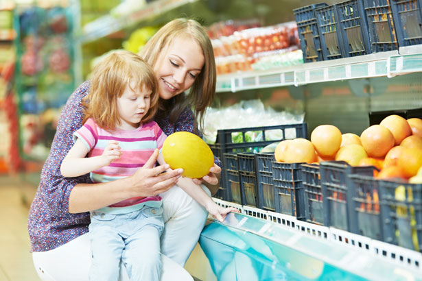 woman and child in grocery store