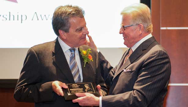 Dr. William Hocking receives Sebold plaque from D. David "Dewey" Sebold