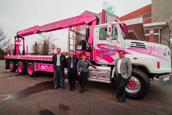 A pink boom truck designed by V&H Trucking in Marshfield was sold at auction for more than $500,000, which included a $205,000 d
