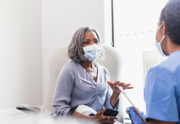 patient talking to doctor