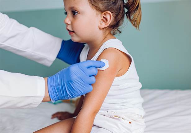 child receiving vaccination