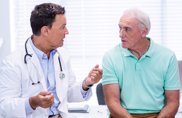 doctor talking to patient