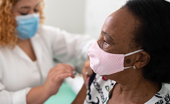 Image of individual getting the COVID-19 vaccine