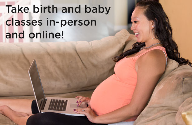 Pregnant woman using a laptop