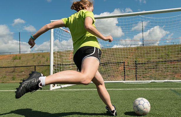 woman playing soccer