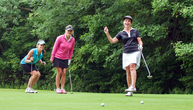 women golfing