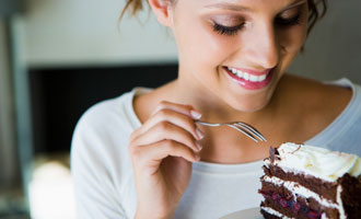 woman eating cake