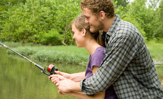 man and chlid fishing