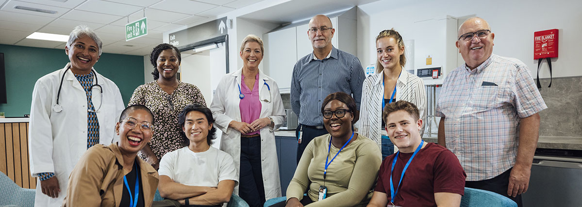 Image of diverse group of people smiling