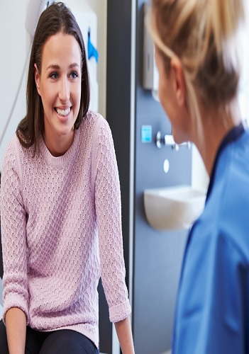 patient talking to doctor