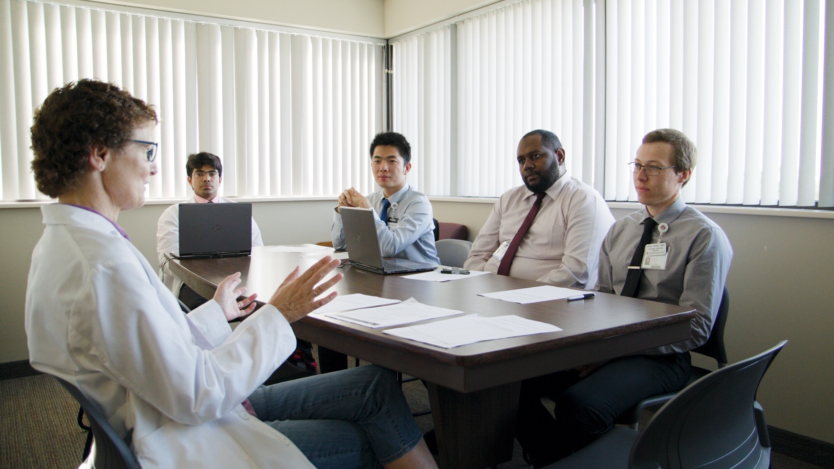 professionals sitting around a table