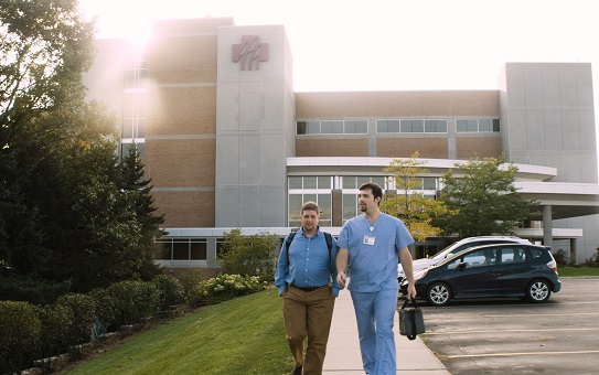 staff walking outside hospital