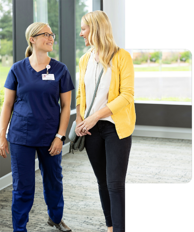 nurse and patient walking