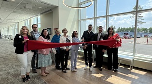 Minocqua staff ribbon cutting